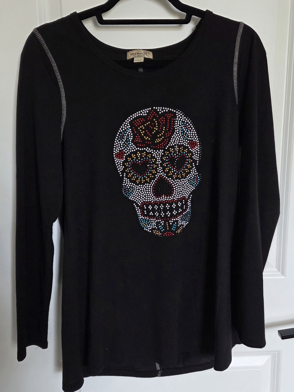 ONE WORLD Black Tee with Embroidered Skull